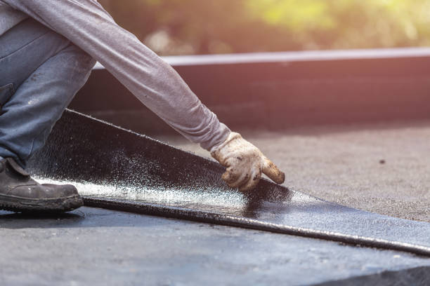 Professional Basement Waterproofing technician working in Fairport, NY